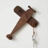 Wooden helicopter wall hook with key holder and hanging strap.