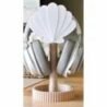 Stylish wooden headphone holder for desk, keeps headphones organised and accessible.