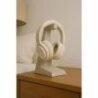 Stylish wooden headphone holder for desk organisation and home decor.