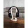 Stylish wooden headphone holder for desk organisation and home decor.
