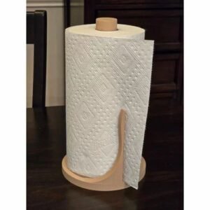 White Paper Towel Roll On A Wooden Holder, Ideal For Kitchen Or Dining Room Use.