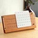 Stylish wooden desktop calendar holder, perfect for home or office organisation.