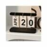 Wooden desktop calendar with date blocks, perfect for home or office decor.