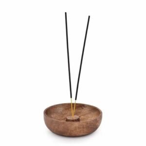 Wooden Incense Holder With Black Incense Sticks For Home Decor.
