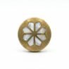 Brass snowflake mirror with geometric design, ideal for contemporary home decor.