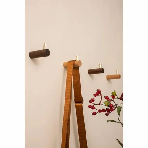 Little Decor Thing Wall Hooks and Plant Decor Wall hooks with wooden finishes for hanging accessories and decor.