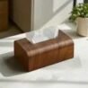Wooden napkin holder for elegant table setting, perfect for rustic or modern home decor. Adds charm.